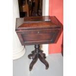 A WILLIAM IV PERIOD MAHOGANY CASKET-SHAPED TEAPOY, with hinged cover, enclosing a divided