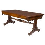 A RECTANGULAR VICTORIAN MAHOGANY LIBRARY TABLE, the top with rounded corners and a tooled leather