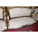 A FIVE PIECE LOUIS XV SUITE OF FRENCH PAINTED AND PARCEL GILT SEAT FURNITURE, painted with parcel