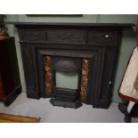 A GOOD LATE 19TH CENTURY HEAVY CAST IRON AND PAINTED MANTLE PIECE