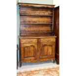 A FRENCH WALNUT DRESSER