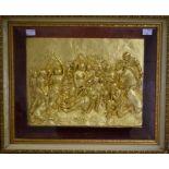 A FRAMED GILT RELIEF