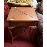 AN EDWARDIAN WALNUT ENVELOPE CARD TABLE