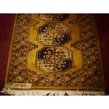 A FAWN GROUND BOKHARA RUG