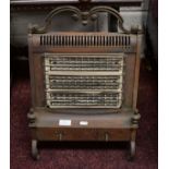 AN OLD METAL ELECTRIC THREE BAR ROOM HEATER