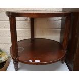 A TWO TIER CIRCULAR MAHOGANY OCCASIONAL TABLE