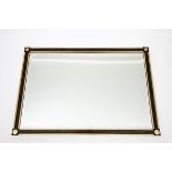 A MODERN RECTANGULAR WALL MIRROR