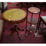 A THREE TIER FOLDING MAHOGANY CAKE STAND