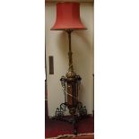 A VERY ORNATE BRASS COPPER WROUGHT IRON AND CUTGLASS STANDARD LAMP,
