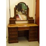 A GOOD VICTORIAN BURL WALNUT BREAKFRONT PEDESTAL DRESSING TABLE