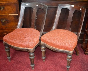 A SET OF FOUR VICTORIAN MAHOGANY SPOON BACK CHAIRS