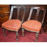 A SET OF FOUR VICTORIAN MAHOGANY SPOON BACK CHAIRS
