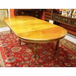 A MAHOGANY PULL-OUT DINING TABLE