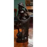 A BALINESE CARVED HARDWOOD FIGURE