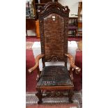 A 17TH CENTURY STYLE CARVED MAHOGANY THRONE CHAIR