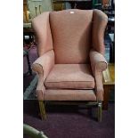 A GEORGIAN STYLE MAHOGANY WING ARMCHAIR