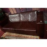 A LARGE THREE SEATER CLUB SETTEE