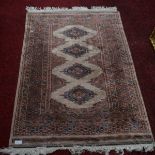 A SMALL TURKISH RUG