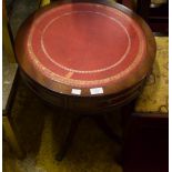 A SMALL REPRODUCTION GEORGIAN STYLE DRUM TABLE