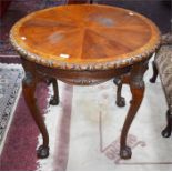 A CIRCULAR CHIPPENDALE STYLE CIRCULAR CENTRE TABLE