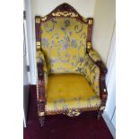 AN ATTRACTIVE MAHOGANY AND PARCEL GILT HIGH-BACK ARMCHAIR