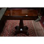 AN EARLY VICTORIAN MAHOGANY FOLD OVER TEA TABLE