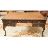 A CHIPPENDALE STYLE MAHOGANY PARTNERS' WRITING TABLE OR DESK