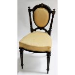 AN ATTRACTIVE SET OF FOUR LATE 19TH CENTURY EBONISED AND PARCEL GILT SIDE CHAIRS
