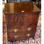 AN EBONY STRUNG AND BOW-FRONTED MAHOGANY COMMODE