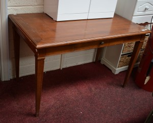 A RECTANGULAR INLAID WALNUT WRITING TABLE