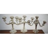 THREE SIMILAR TWO BRANCH THREE LIGHT SILVER PLATED CANDELABRA. (3)