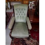 A VICTORIAN ARMCHAIR