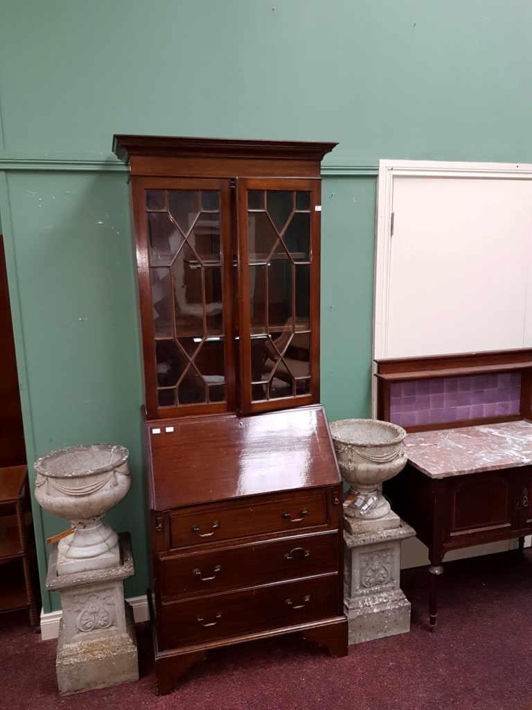 A MAHOGANY SLOPE-FRONT BUREAU BOOKCASE