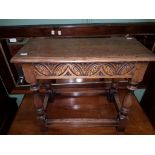 AN EARLY 18TH CENTURY STYLE OAK JOINERS STOOL,