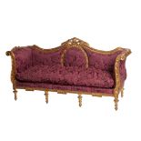 A LARGE GILT SETTEE