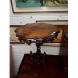 AN UNUSUAL VICTORIAN WALNUT CENTRE TABLE