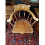 TWO SIMILAR ELM AND ASH WINDSOR KITCHEN ARMCHAIRS