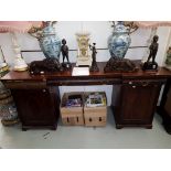 A NINETEENTH CENTURY INLAID MAHOGANY PEDESTAL SIDE BOARD