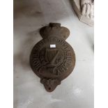 A VERY HEAVY CAST IRON WALL CREST FOR THE ROYAL IRISH CONSTABULARY