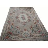 A LARGE CHINESE WOOL RUG