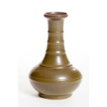 A VERY UNUSUAL OLIVE GREEN RIB-MOULDED BOTTLE VASE