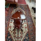 A THREE-TIER MAHOGANY OCCASIONAL STAND,