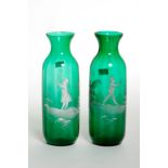 A PAIR OF MARY GREGORY STYLE GREEN GLASS VASES