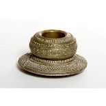 AN INDIAN BRASS CIRCULAR STAND