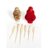 A COLLECTION OF ANIMAL FORM BONE OR IVORY TOOTHPICKS