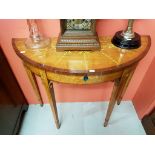 A DEMI LUNE SATINWOOD SIDE TABLE