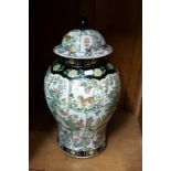 A LARGE CHINESE FAMILLE NOIR STYLE PORCELAIN VASE AND COVER
