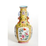 A VERY ATTRACTIVE YELLOW GROUND PORCELAIN BOTTLE VASE