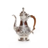 A GEORGE III SILVER PEAR-SHAPED COFFEE POT