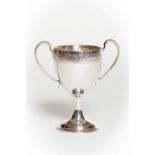 A GOOD IRISH GEORGE III PERIOD BRIGHT-CUT SILVER TWO-HANDLED LOVING CUP